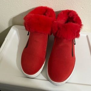 Red suede and faux fur shoes.